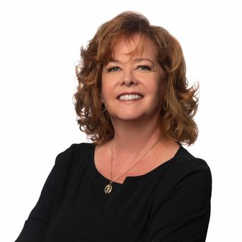 Portrait of Madeline Carriger, REALTOR®.